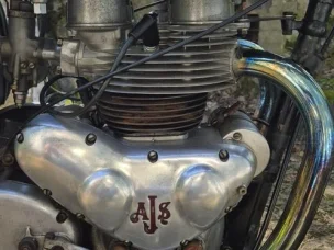 AJS -